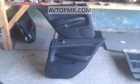 Door trim panel, rear left, Infiniti G25 G35 G37 4d 06-11