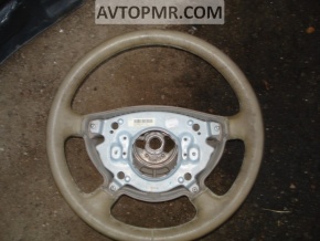 Mercedes W211 bare steering wheel with beige tires, pre-restoration