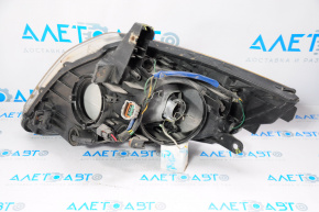 Nissan 350z 2005 front right headlight, bare xenon, broken mounts, crack, scratches, no covers