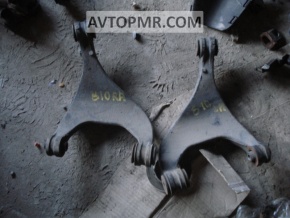 Upper rear right control arm for a Subaru B10 Tribeca