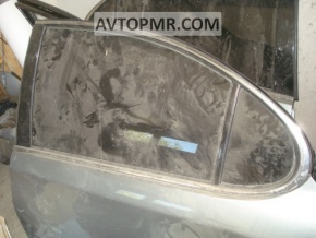 Rear left door glass for a Lexus ES300 ES330