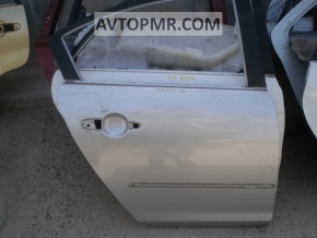 The bare rear right door of a Mazda3 03-08