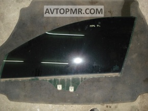 The front right door glass of a Mazda3 MPS 09-13 has a scratch.