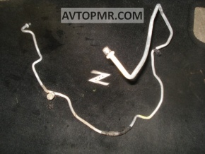 The air conditioning hose is long, iron, and thin. Nissan Leaf 11-12