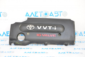The Toyota Camry V40 hybrid engine cover has a painted inscription.