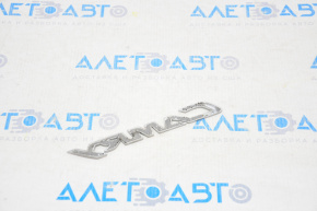 The "CAMRY" emblem on the Toyota Camry v40 trunk lid