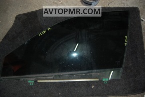 Front left door glass for a Lexus ES300 ES330