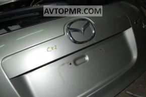 Mazda CX-7 06-12 tailgate badge MAZDA emblem