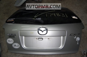 The "CX-7" emblem on the tailgate of the Mazda CX-7 06-12