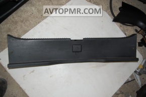 The trunk opening trim of the Mazda3 03-09 HB is worn out