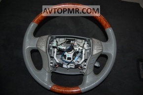 Naked steering wheel for Toyota Avalon 2005-2007, gray with wood trim.