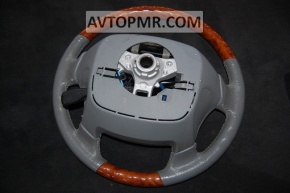 Naked steering wheel for Toyota Avalon 2005-2007, gray with wood trim.
