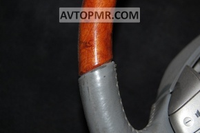 Naked steering wheel for Toyota Avalon 2005-2007, gray with wood trim.