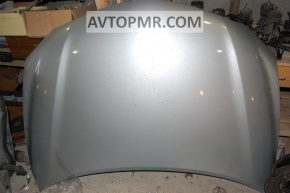 The bare hood of a Toyota Camry V40