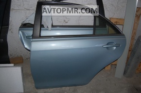 The rear left door is bare, Toyota Camry v40.