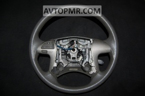 The naked steering wheel of a Toyota Camry V40