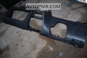 The dashboard, bare lower part of the Toyota Corolla E12 02-06, is gray.