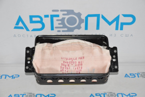 Passenger airbag in the dashboard of a 2014 Dodge Challenger.