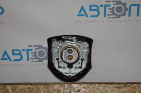 Steering wheel airbag for the driver's side of a 1996 Dodge Dart, black, rusty squib