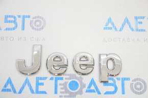 The Jeep Patriot 11-17 tailgate emblem reads "JEEP."