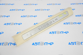 Door sill trim front right Lincoln MKC 15-16 beige with backlight, dents on chrome