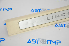 Door sill trim front right Lincoln MKC 15-16 beige with backlight, dents on chrome