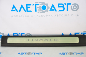 Lincoln MKZ 13-14 black front left door sill plate with chrome trim and backlight
