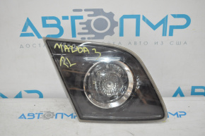 Left inner trunk lid light Mazda3 03-09 HB rest