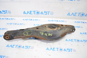 The lower control arm under the rear left spring is rusty for a Mazda 6 14-17.