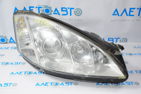 Mercedes W221 07-09 right front headlight, bare bi-xenon, broken mounts, chipped, missing cover