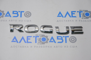 The ROGUE emblem is on the tailgate of the Nissan Rogue 14-20.
