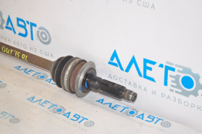 The rear left half shaft of a Subaru Outback 15-19 is rusty.