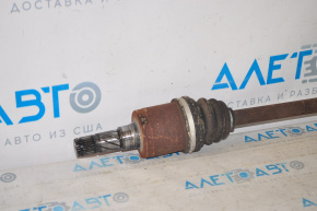 The rear left half shaft of a Subaru Outback 15-19 is rusty.