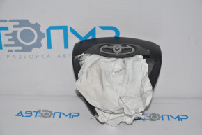 The airbag in the driver's steering wheel of a Toyota Avalon 13-18 exploded.