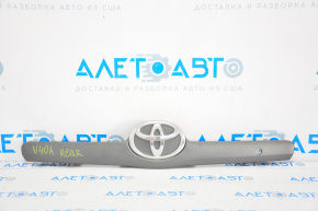 Toyota Camry v40 07-11 trunk lid trim with button emblem