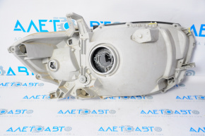 Left front headlight for Toyota Highlander 2010 hybrid, halogen, missing 2 fasteners, polishable
