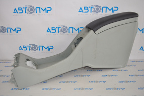 The center console from the armrest to the cup holder of the Toyota Prius 30 10-11 is gray.
