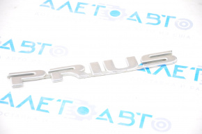 The PRIUS emblem on the trunk door of the Toyota Prius 30 10-15