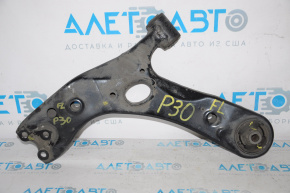 The lower front left control arm of a Toyota Prius 30 10-15 is torn.