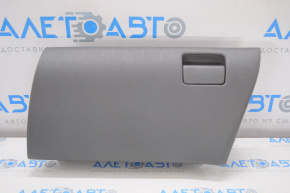 The glove compartment, glove box, upper part of the Toyota Prius V 12-14, is dark gray.