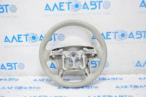 Naked steering wheel for a Toyota Sienna 11-15 with gray tires.