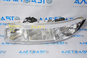Left front headlight for a Saturn S-series coupe (97-00), halogen, missing chrome, scratches