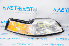 Headlight front right Ford Mustang 99-04 bare halogen, scratches, chips, broken fasteners