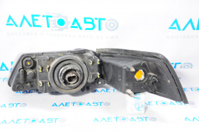 Headlight front right Ford Mustang 99-04 bare halogen, scratches, chips, broken fasteners