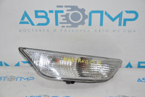 Left turn signal in the bumper of a Ford Mustang mk6 15-17