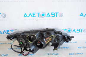 Headlight front left Nissan Rogue 14-16 bare, halogen, scratches on element, broken housing
