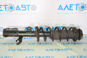 Shock absorber front left Nissan Versa Note 13-19