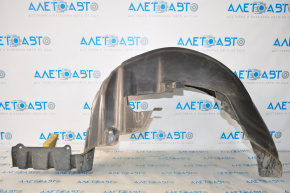 The rear left fender liner of a Subaru Outback 15-16 is torn.