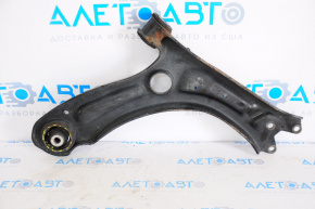 The lower front left control arm of a VW Jetta 11-18 USA has a torn silent block.