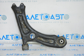 The lower front right control arm of a VW Jetta 11-18 USA has a torn silent block.